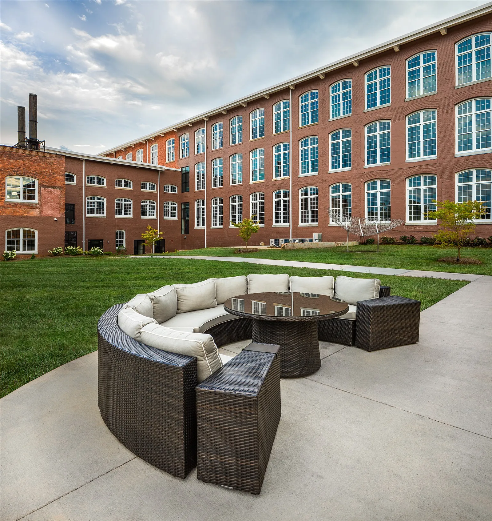 Outdoor fireplace lounge at Drayton Mills Lofts