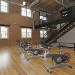 2 Story Fitness Center At Drayton Mills Loft Apartments In Spartanburg, SC