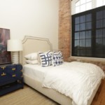 Spacious Bedrooms With Large Windows At Drayton Mills Loft Apartments In Spartanburg, SC