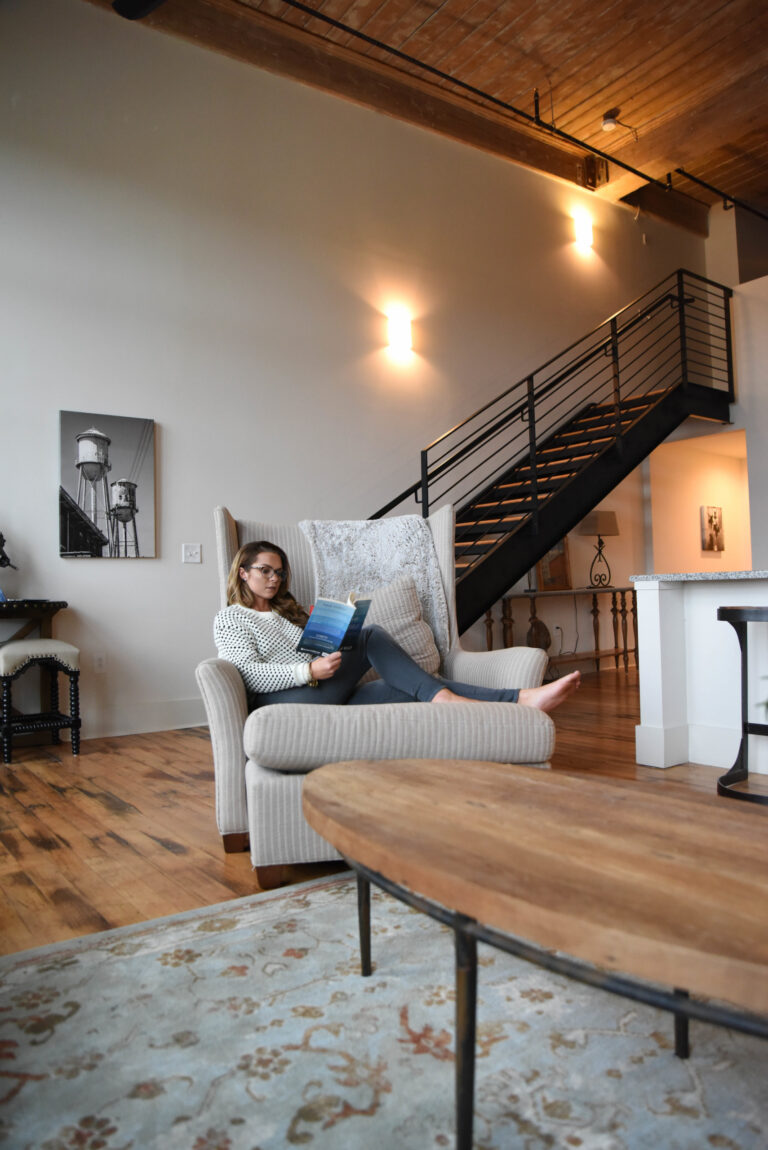 View Of Staircase To Loft In Apartment At Drayton Mills Loft Apartments In Spartanburg, SC